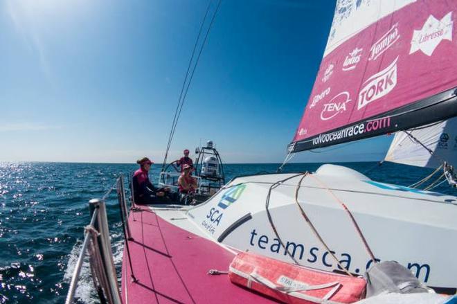 Onboard Team SCA. Day 7. Elodie Mettraux, Sally Barkow and Sam Davies trimming and driving in light air - Leg 7 to Lisbon - Volvo Ocean Race &copy; Anna-Lena Elled/Team SCA